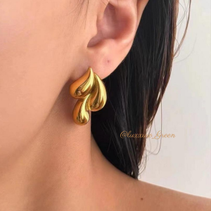 Abstract Golden Leaf Statement Earrings - Image 1
